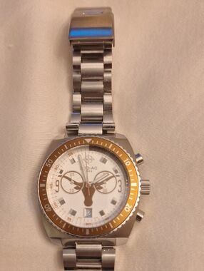 Vintage Zodiac Stainless Steel Watch with Gold-Tone Bezel and White Dial